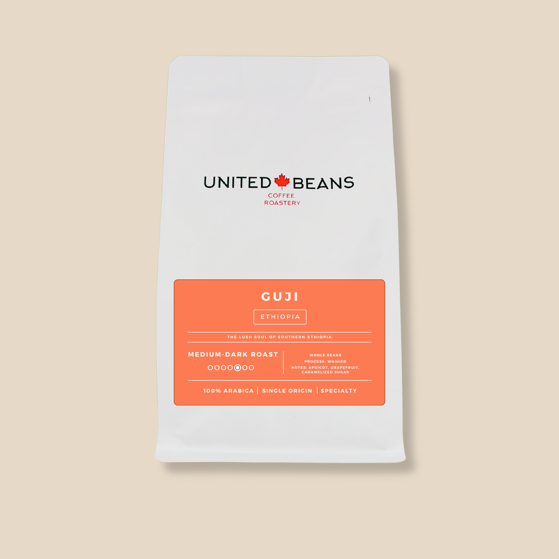 <img src="guji-ethiopia-coffee.png" alt="Guji Ethiopia medium-dark roast whole bean coffee label featuring flavor notes of apricot, grapefruit, and caramelized sugar">