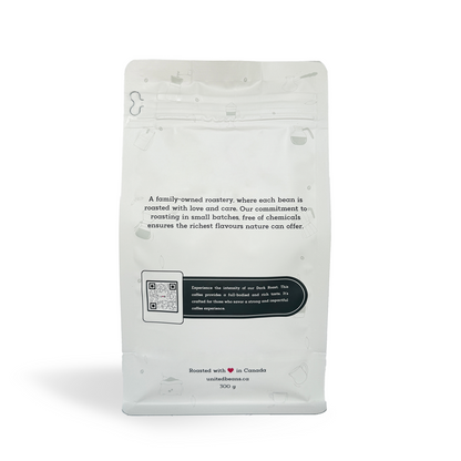 Back view of organic dark roast coffee bag, showcasing premium coffee from United Beans Coffee Roastery